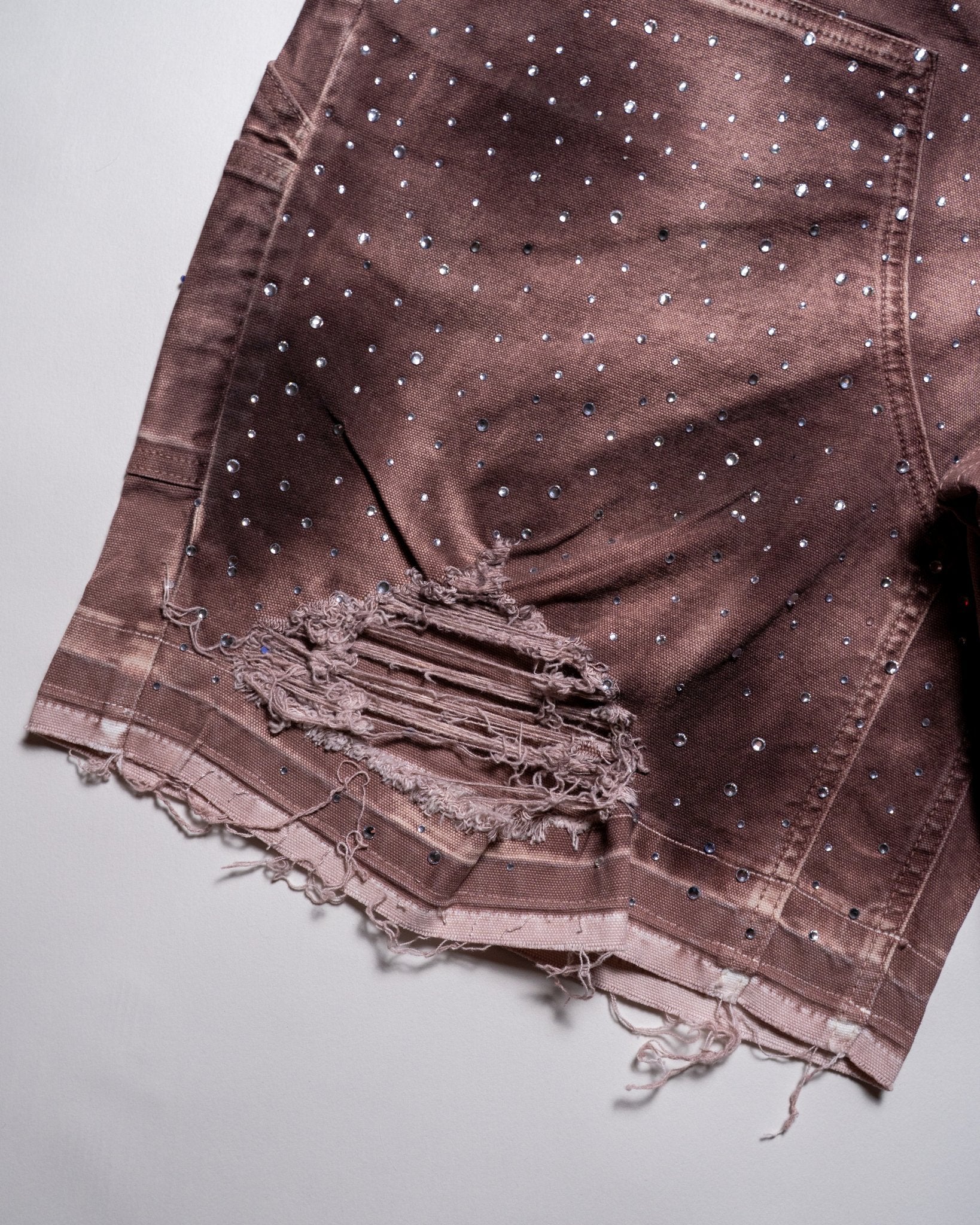 Shorts cristallizzati in arancione bruciato
