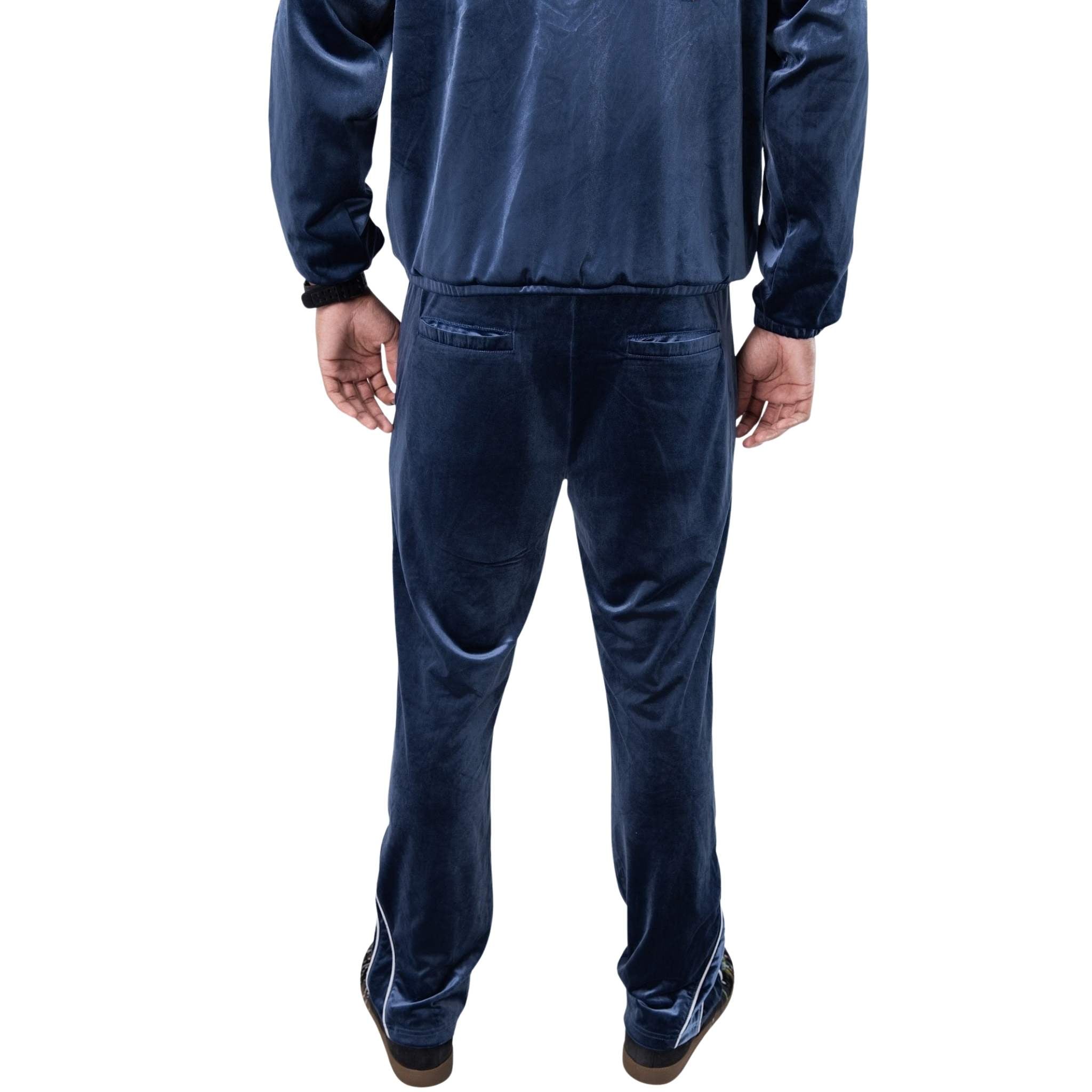 Blue velour pants with relaxed fit and rear pockets