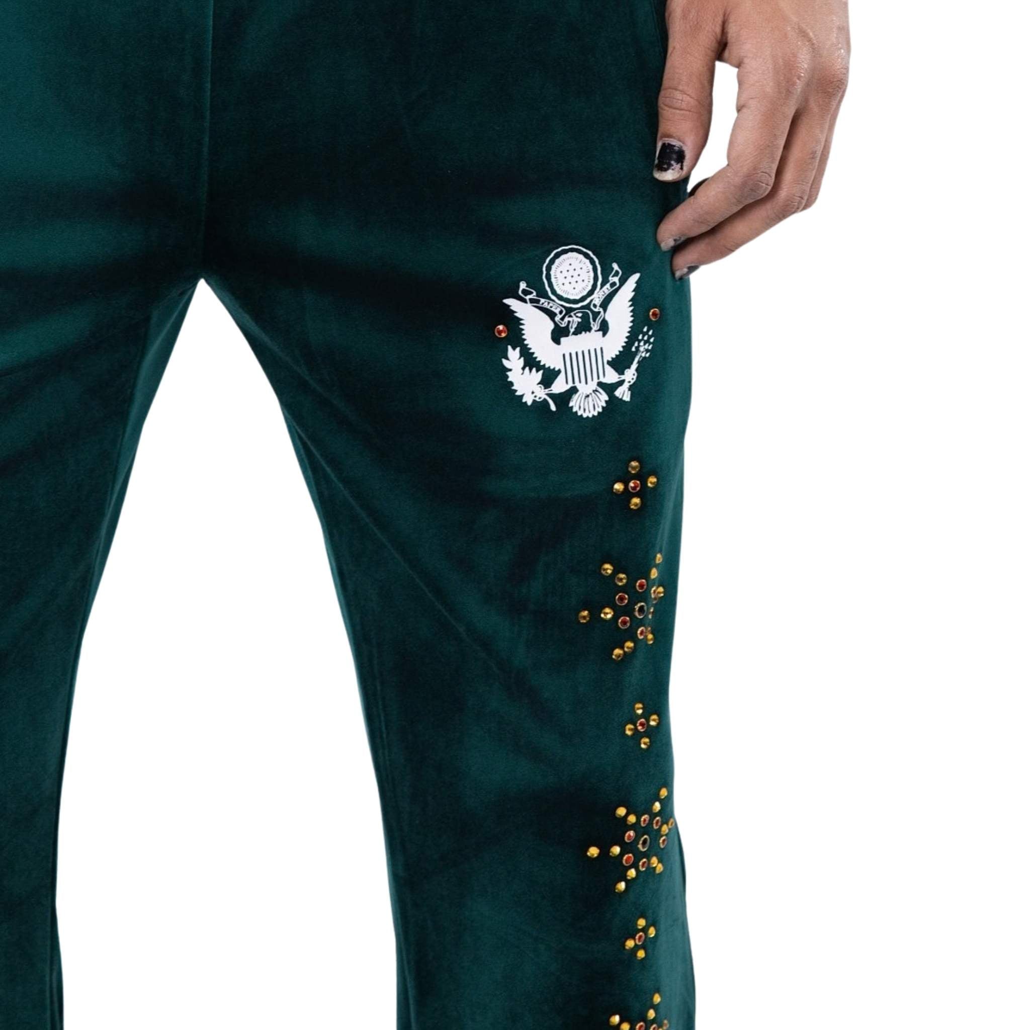 Velour fabric with stud detailing on emerald track pants