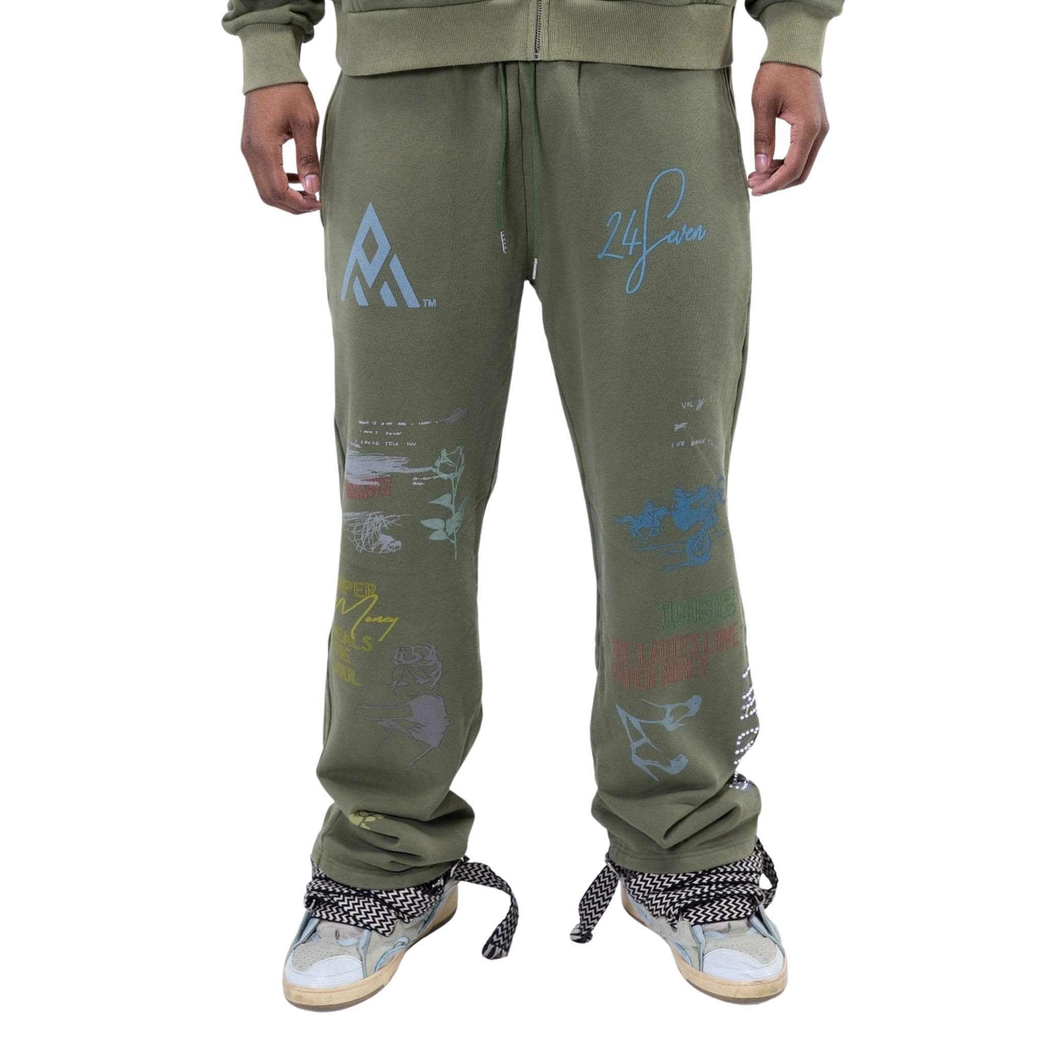 Green graphic joggers with printed artwork – front view