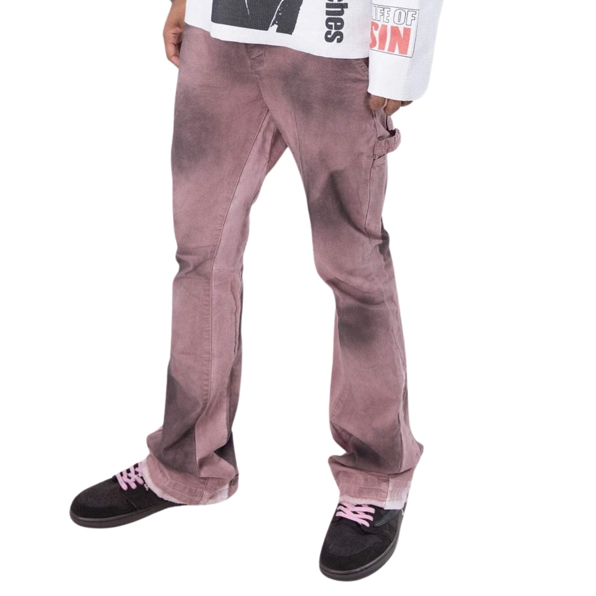 Men’s rust utility carpenter pants styled with streetwear outfit