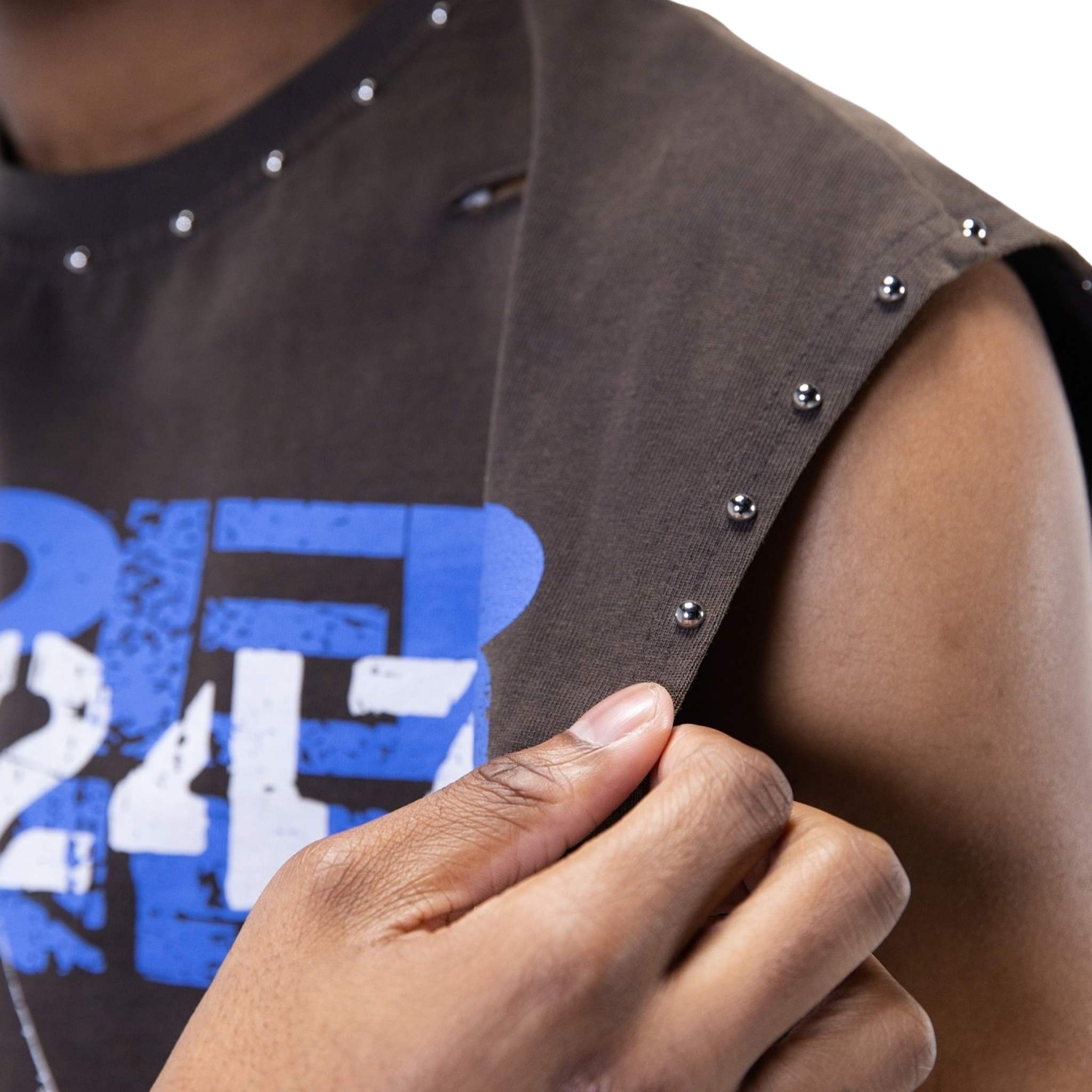 Distressed studded tank top detail – heavyweight vintage sleeveless t-shirt